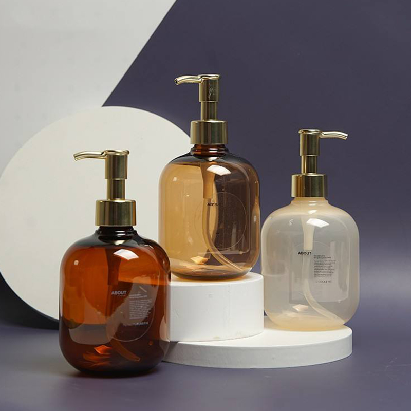 300 ml 500 ml PET plastový jantarový kulatý prázdný kondicionér Láhev na tělové mléko Zlatá lahvička na šampon s pumpičkou PET