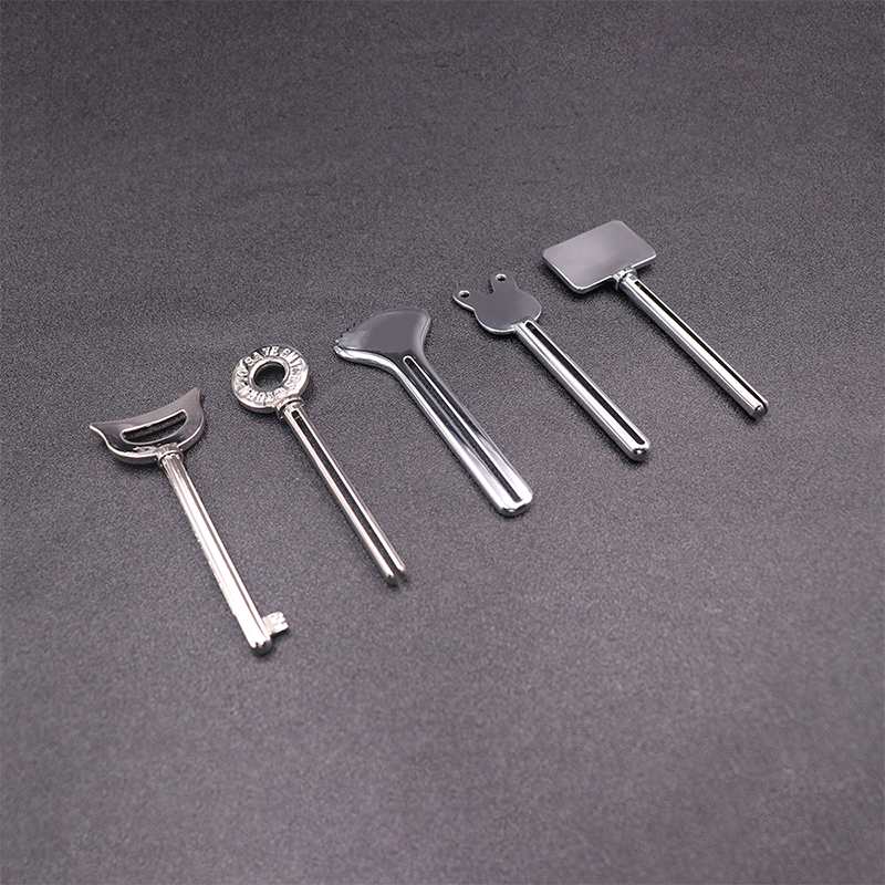 Kovový dávkovač zubní pasty Čisticí prostředek na obličej Lis na tuby na zuby Key Shape Kosmetika na tuby Kovový dávkovač zubní pasty Čisticí prostředek na obličej Lis na tuby na zuby Key Shape Kosmetika na tuby