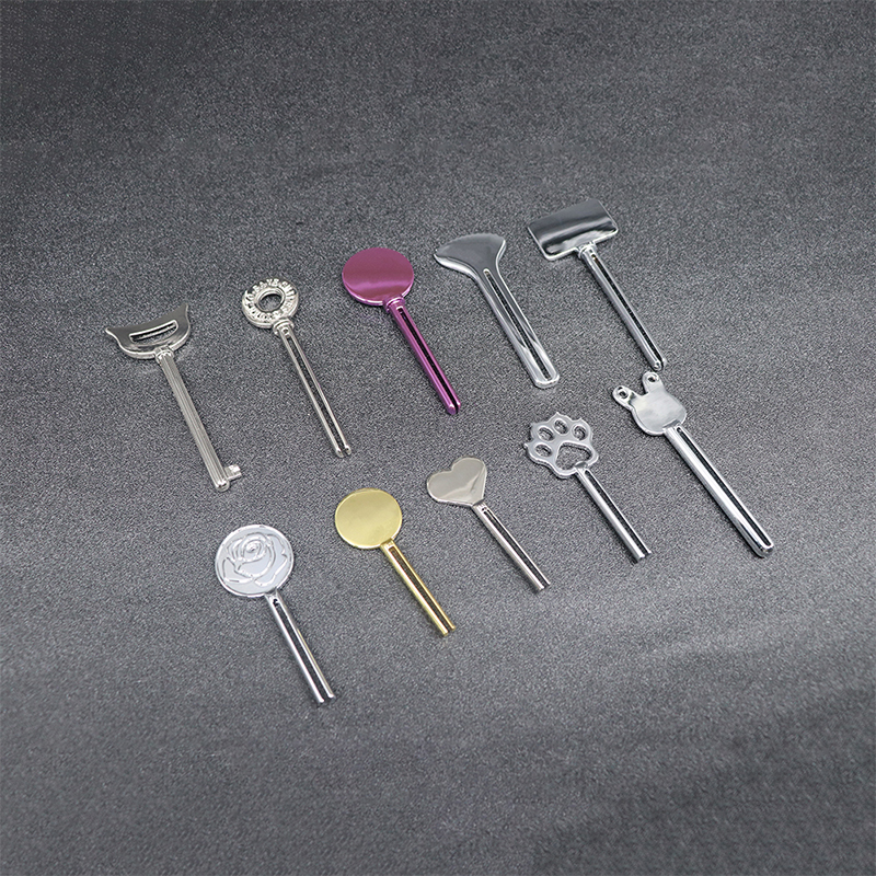 Kovový dávkovač zubní pasty Čisticí prostředek na obličej Lis na tuby na zuby Key Shape Kosmetika na tuby Kovový dávkovač zubní pasty Čisticí prostředek na obličej Lis na tuby na zuby Key Shape Kosmetika na tuby