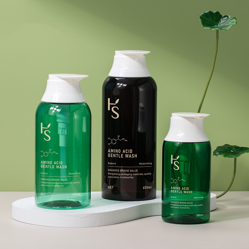 Unique Green 300 ml 500 ml 650 ml PET New Shape Body Lotion Cream Prázdná láhev Láhev šamponu s kulatým ramenem s pumpičkou pro péči o pleť Unique Green 300 ml 500 ml 650 ml PET New Shape Body Lotion Cream Prázdná láhev Láhev šamponu s kulatým ramenem s pumpičkou pro péči o pleť