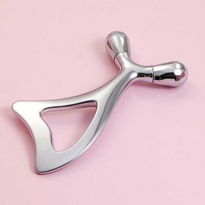 Masážní váleček na oči ze slitiny zinku a nástroj Gua Sha na obličej Masážní váleček na oči ze slitiny zinku a nástroj Gua Sha na obličej